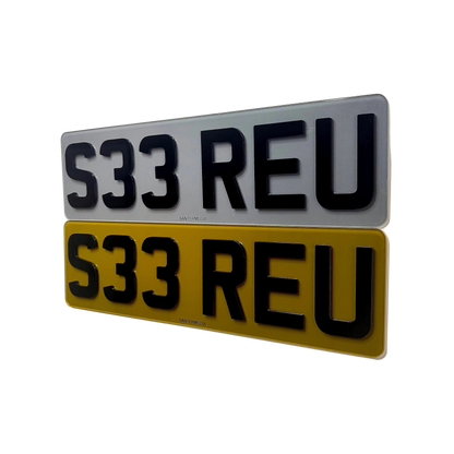 A pair of shortened tinted 4D number plates with a slogan