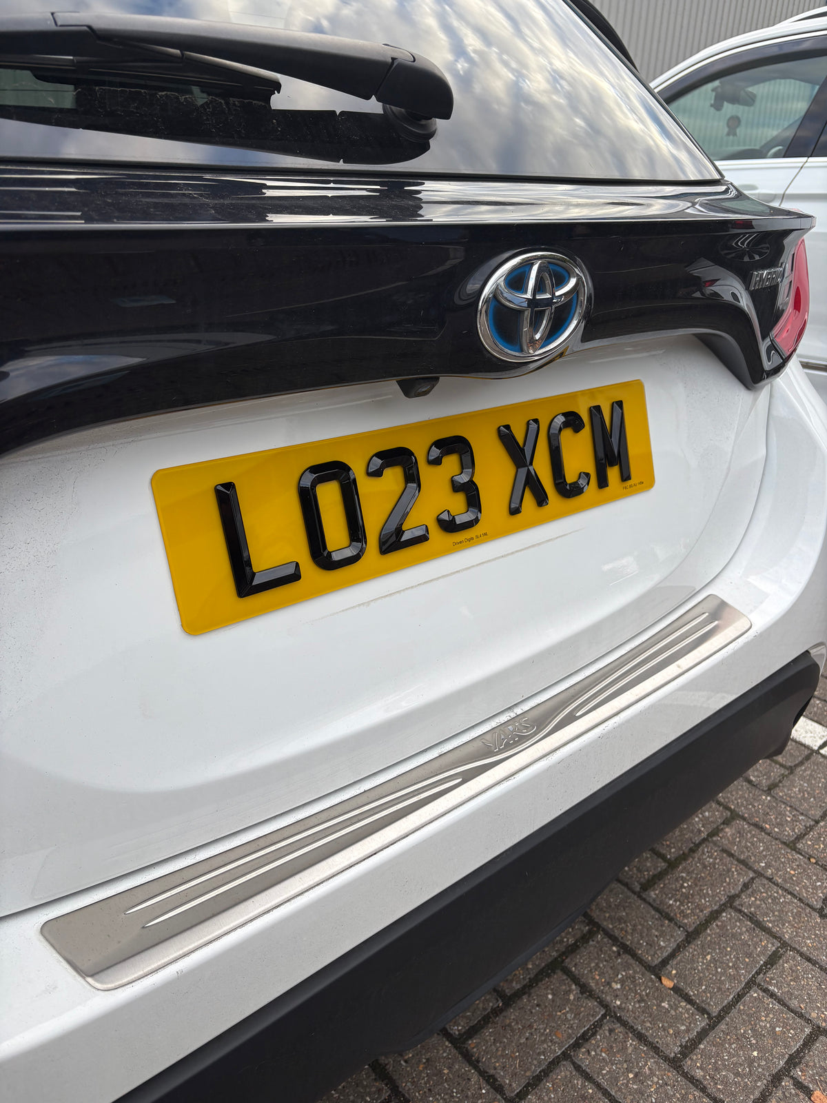 Rear 4D retro number plate shown on a car made by Driven Digits