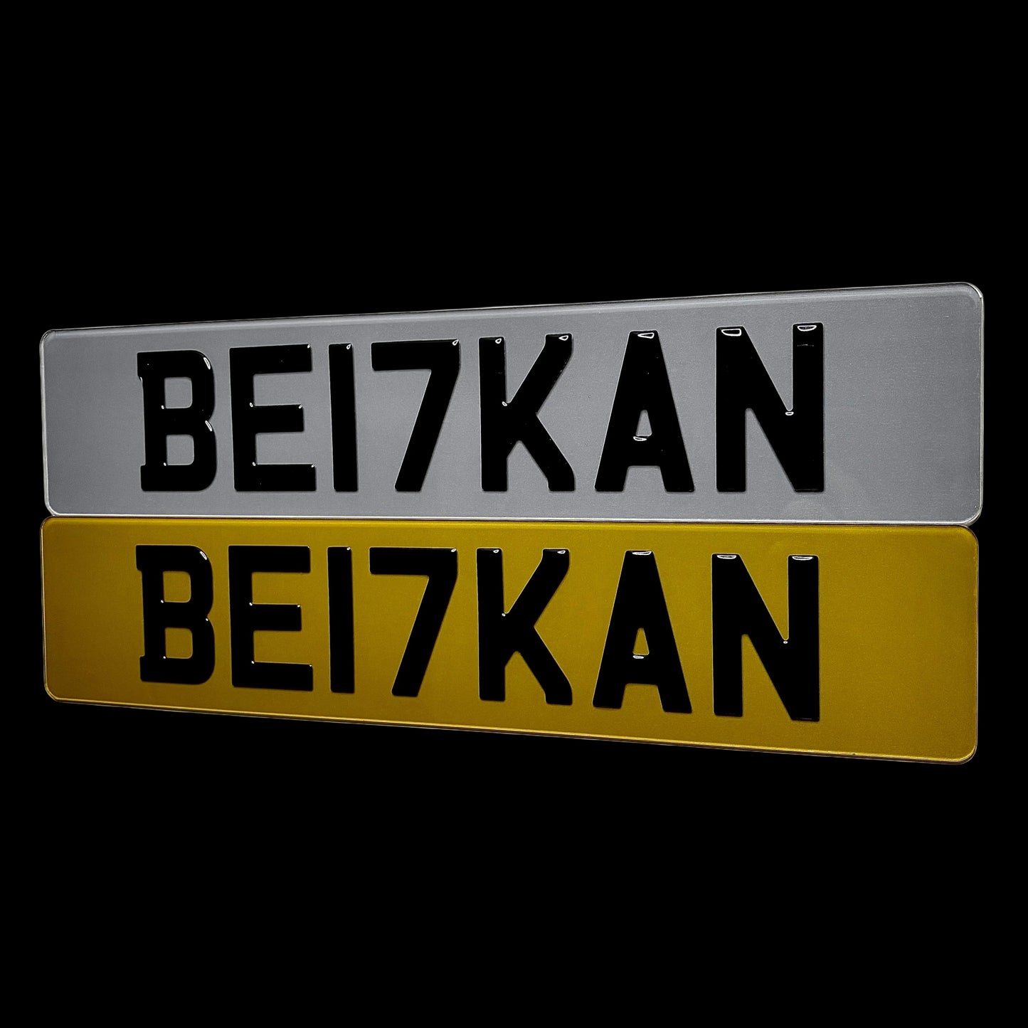 Two license plates with 'BE17KAN' text on a white background