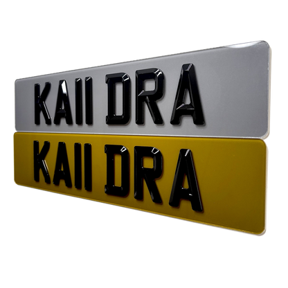Two license plates with 'KAIIDRA' text on a white background