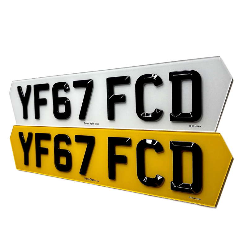 Two hex license plates with 'YF67 FCD' text on a white background