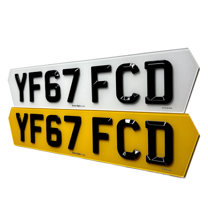 Two hex license plates with 'YF67 FCD' text on a white background