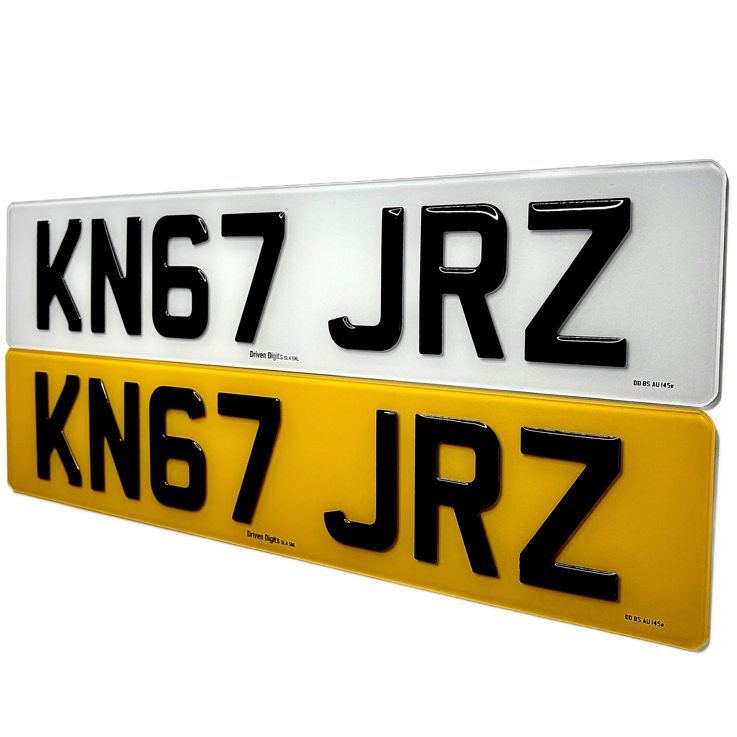 Two rectangular license plate style signs with the black text 'KN67 JRZ' shown on white and yellow backgrounds, isolated on a black background.