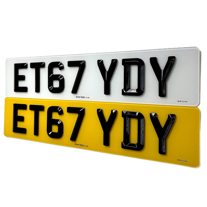Two rectangular license plate style signs shown on a white background, one white and one yellow, both with black raised alphanumeric lettering reading ET67 YDY.