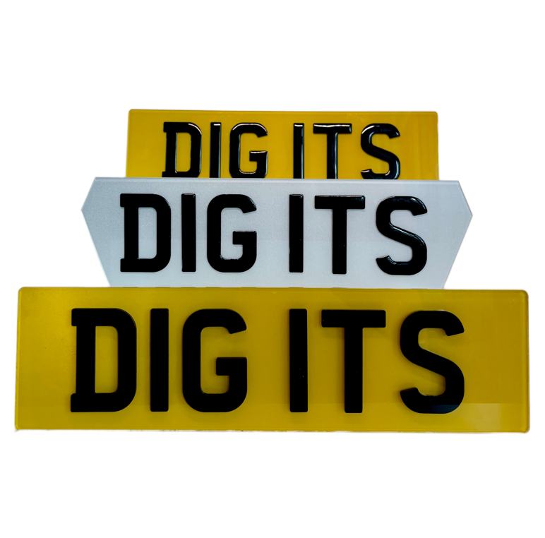 Stack of three rectangular blocks with 'DIG ITS' text on a white background